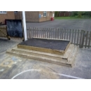 raised wooden sandpit